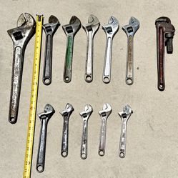 Assorted Crescent Wrenches and Pipe Wrench