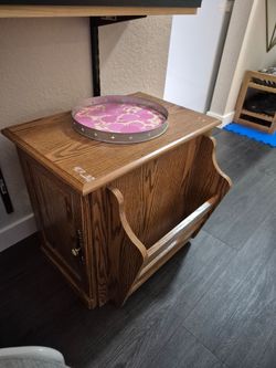 Side table with magazine rack on side