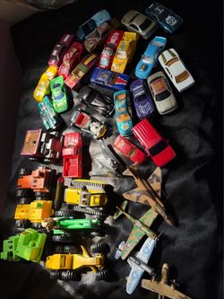 Vintage die ast toy cars trucks and airplanes