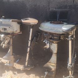 Trolling Motors And Two Small Outboard Engines