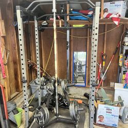 Squat Rack With Weights And Barbell 