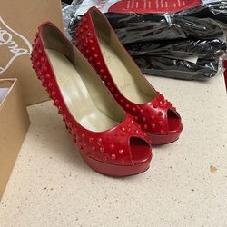 Red Spike Heels