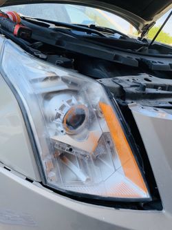 11-15 Cadillac SRX right passenger side halogen headlight, genuine GM part