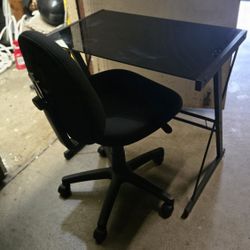 office chair on Wheels and glass top table