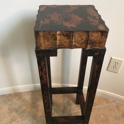  Elegant  stand with  black, gold, & wood finish.  30” high & 10” wide.