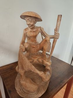 Fisherman with Ducks