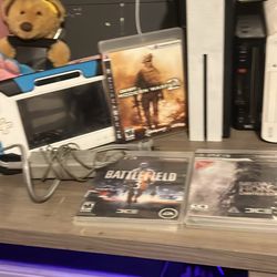 Wii and Wii u console with controller and games 