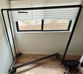 Industrial Black Pipe Clothing Rack on Wheels