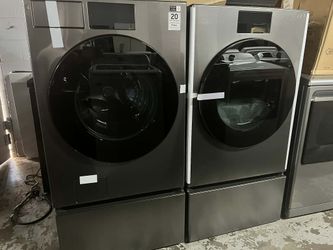 Samsung Dark Steel Front Load AI Smart 5.3 Cu. Ft. Washer/7.6 Cu. Ft. Electric Dryer Laundry Pair With Pedestrals