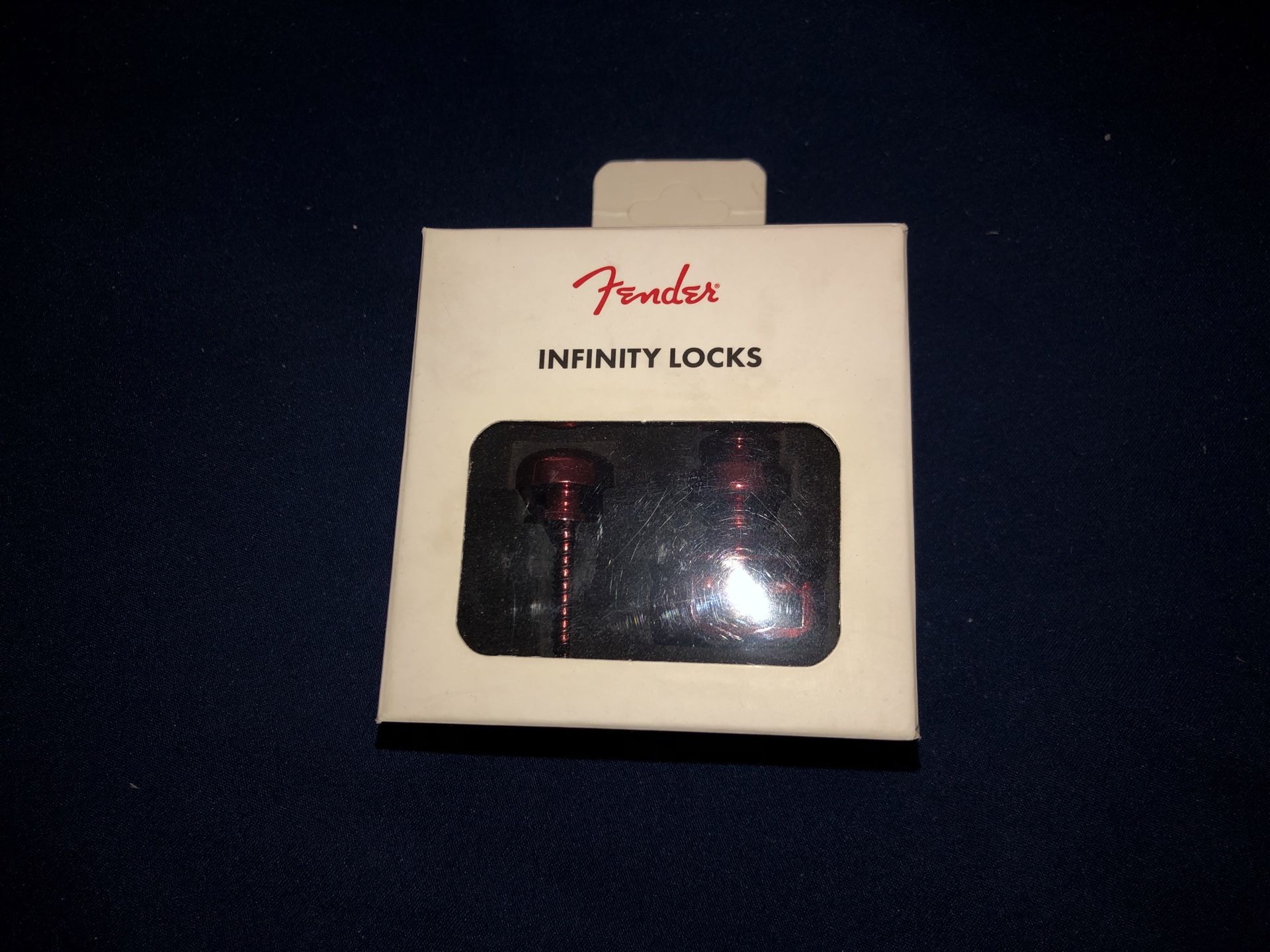 Fender anodized red infinity strap locks