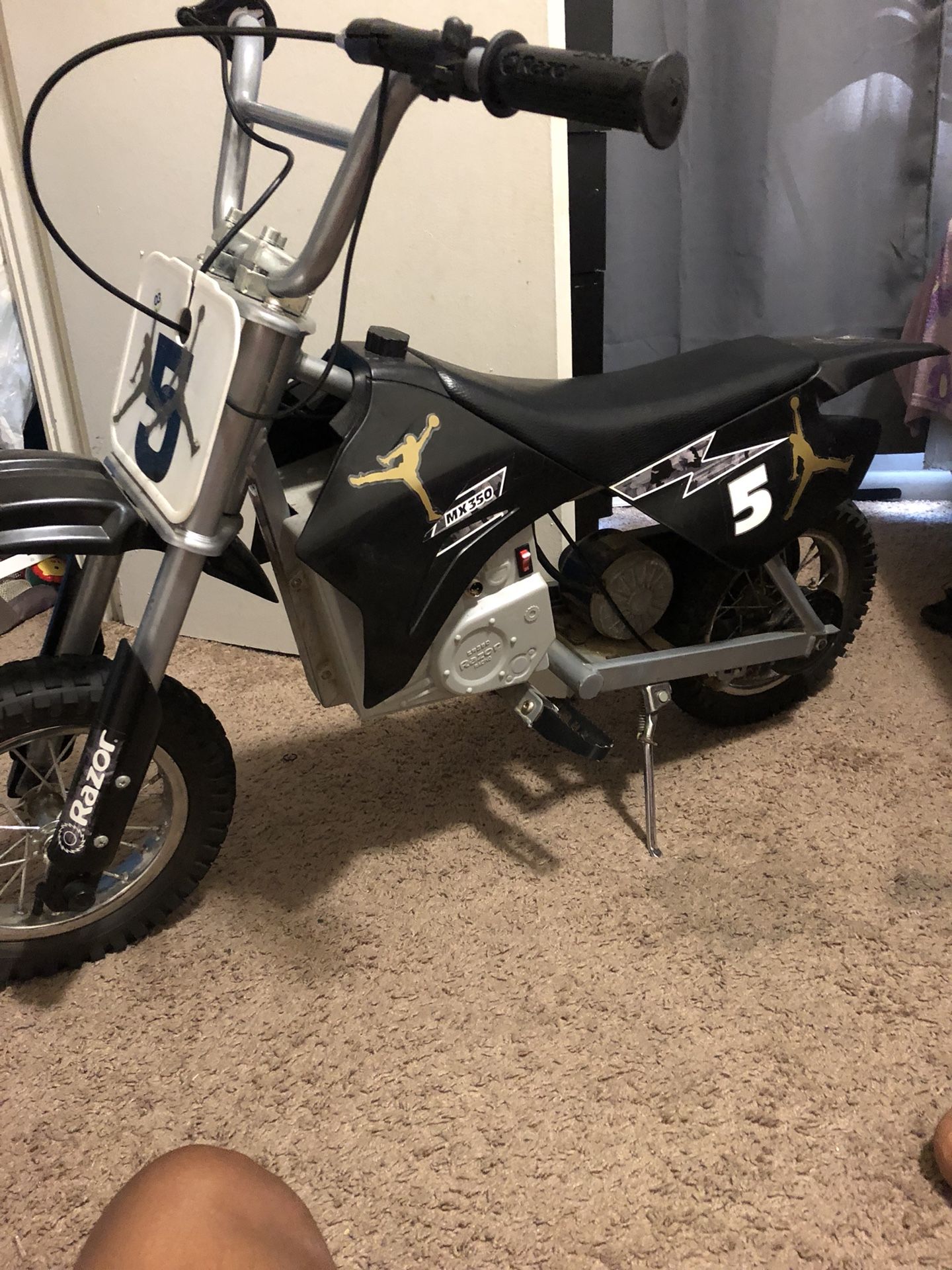 Baby girl electric car comes with remote for adult use to control the car. And electric dirt bike