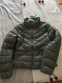 green puffer jacket