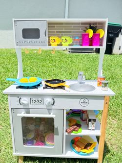KidKraft play kitchen for sale with accessories.