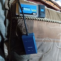 Lexi Wireless G Notebook Adapter 2.4 Gig That Hurts And Trinidnet Router I Think Not Sure What It Is