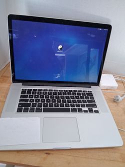 MacBook pro 15 inch mid laptop