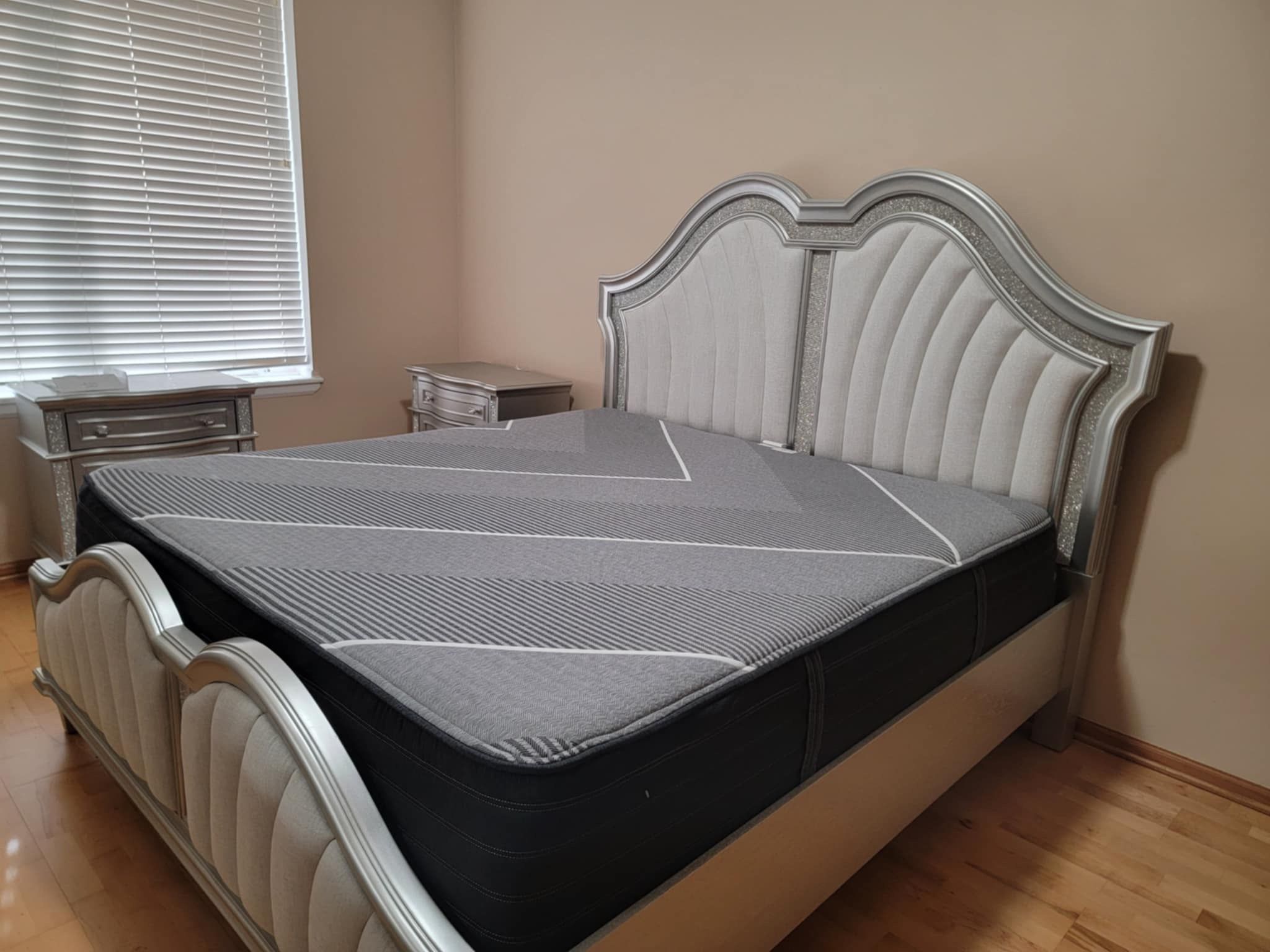 Black king-sized Beauty-rest Mattress.