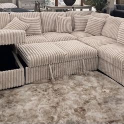 Beautiful Sectional With Pull Out Bed & Storage 