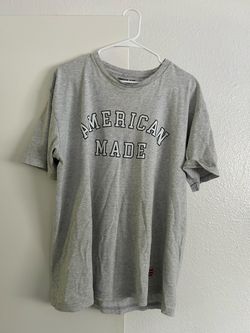 Used t-shirts one sticks one Metallica one Ocean Shores, one American made