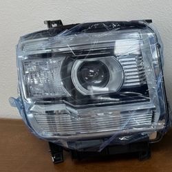 GMC Sierra Right Headlight 