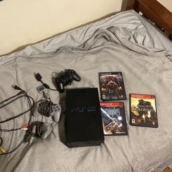 Never used PS2 + 3 Controllers + 3 Games