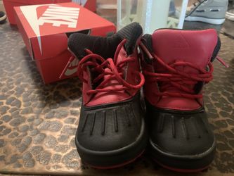 Red and black Nike shoes kids 8