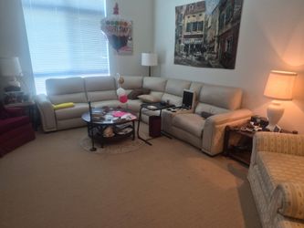 Large sectional Macy's prime collection leather sofa with two recliner seats