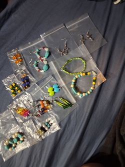 Each bracelet 5$ and each earing 5$ all of them come with small bags