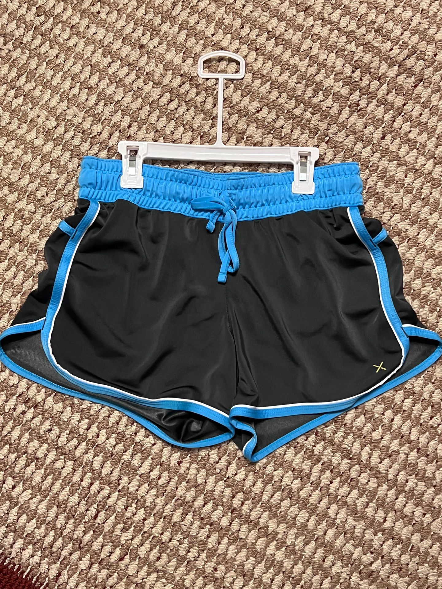 womens xersion black and blue shorts, size small