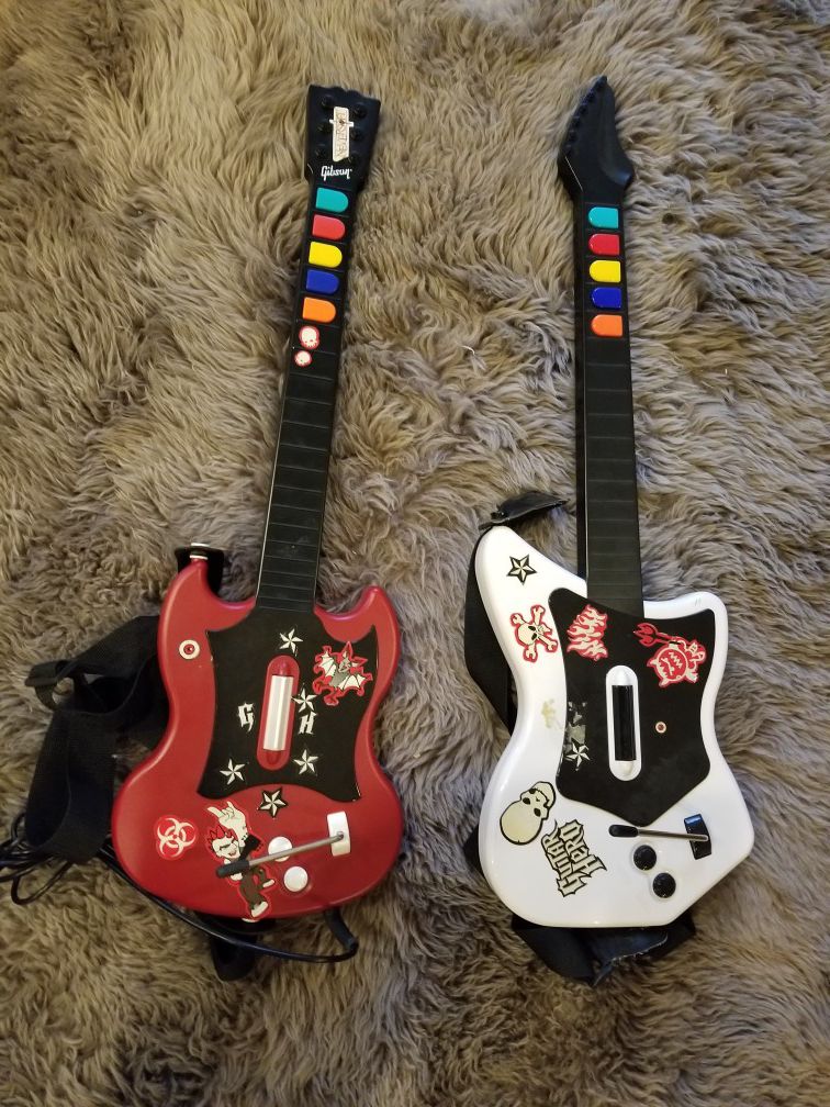 2 ps2 guitar hero guitars (red wired, white no dongle)
