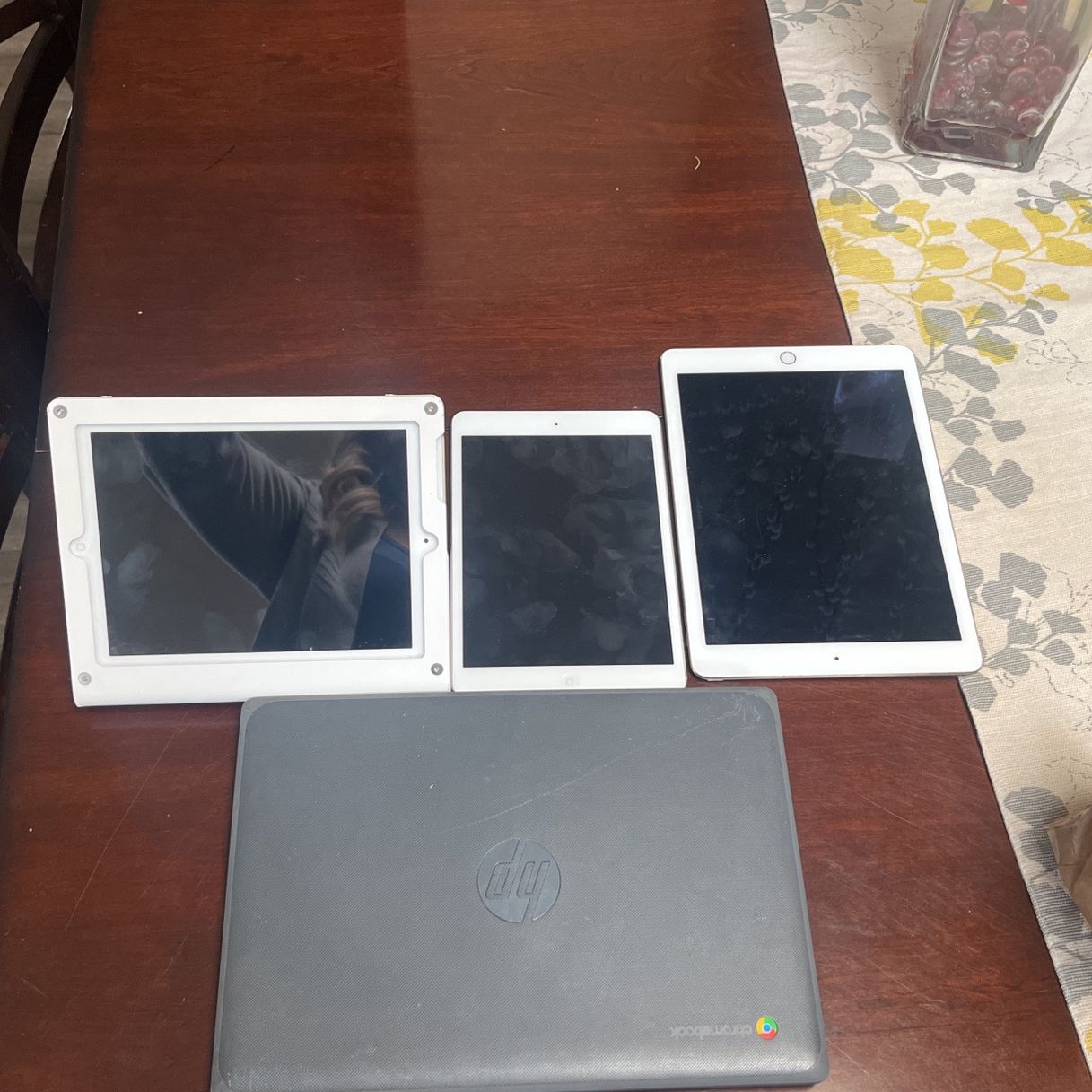 3 iPads , One Chrome Book 