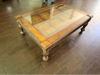 Brown wood glass top coffee table