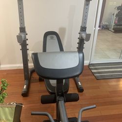 Heavy duty adjustable weight bench with legs and curl bed attachments and squat Rack