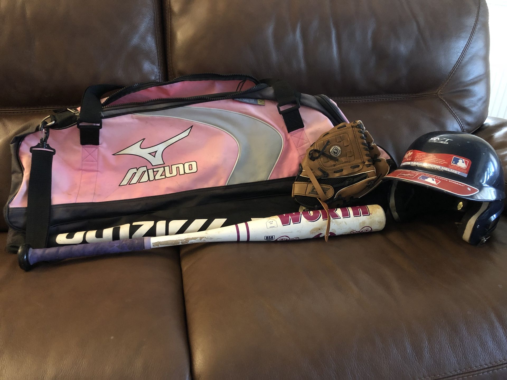 Girls bat bag, softball bat, and unisex glove and helmet