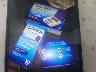Brand New touchscreen Clearblue Fertility Monitor with test strips.