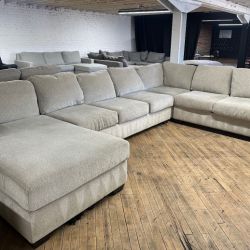 Delivery available Ashley u shape sectional couch