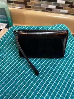 Vintage HOBO Luxe Black Leather bi-fold wallet with hidden strap and key ring.
