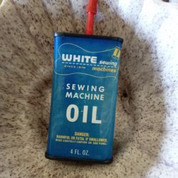 Old White Sewing Machine Oil 