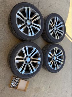 GMC Yukon Denali 22” wheels and new Goodyear 285/45R22 tires