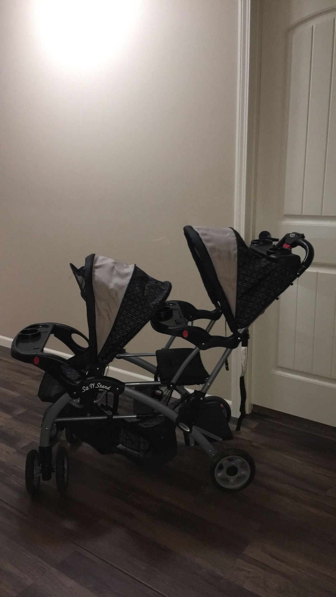 Double stroller sit N stand.