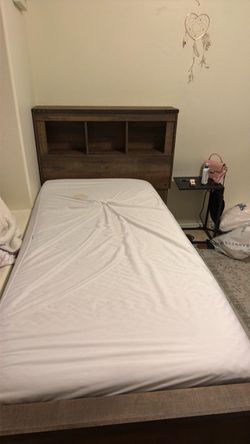 Twin bed frame with mattress