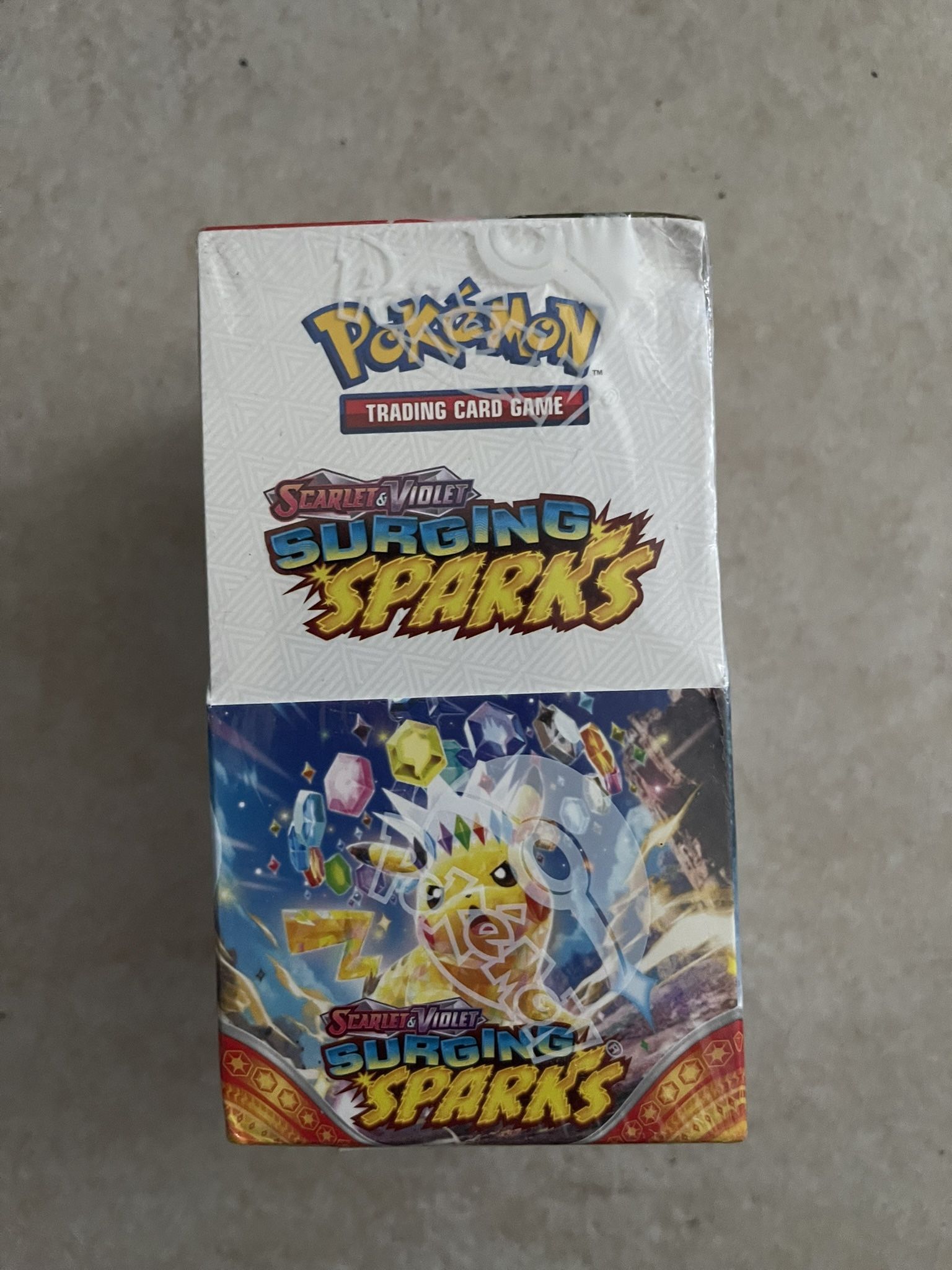 Pokemon Surging Sparks Sealed Half Booster Box (18 Packs)