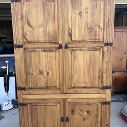  Rust Wood TV Cabinet. 49”W x 25”D x 90”H. 