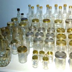 Assorted Mason Jars And Wine Bottles 