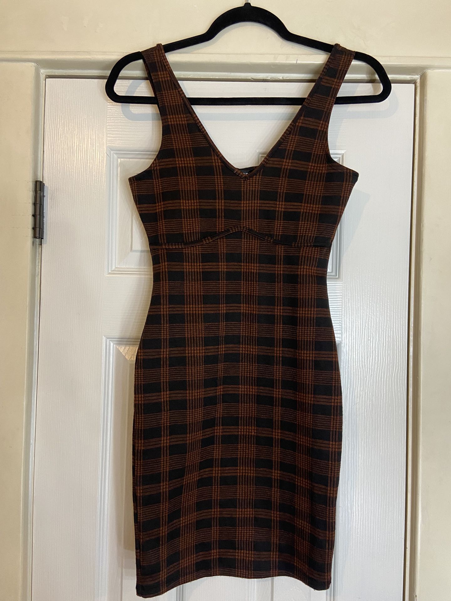 Woman’s plaid dress