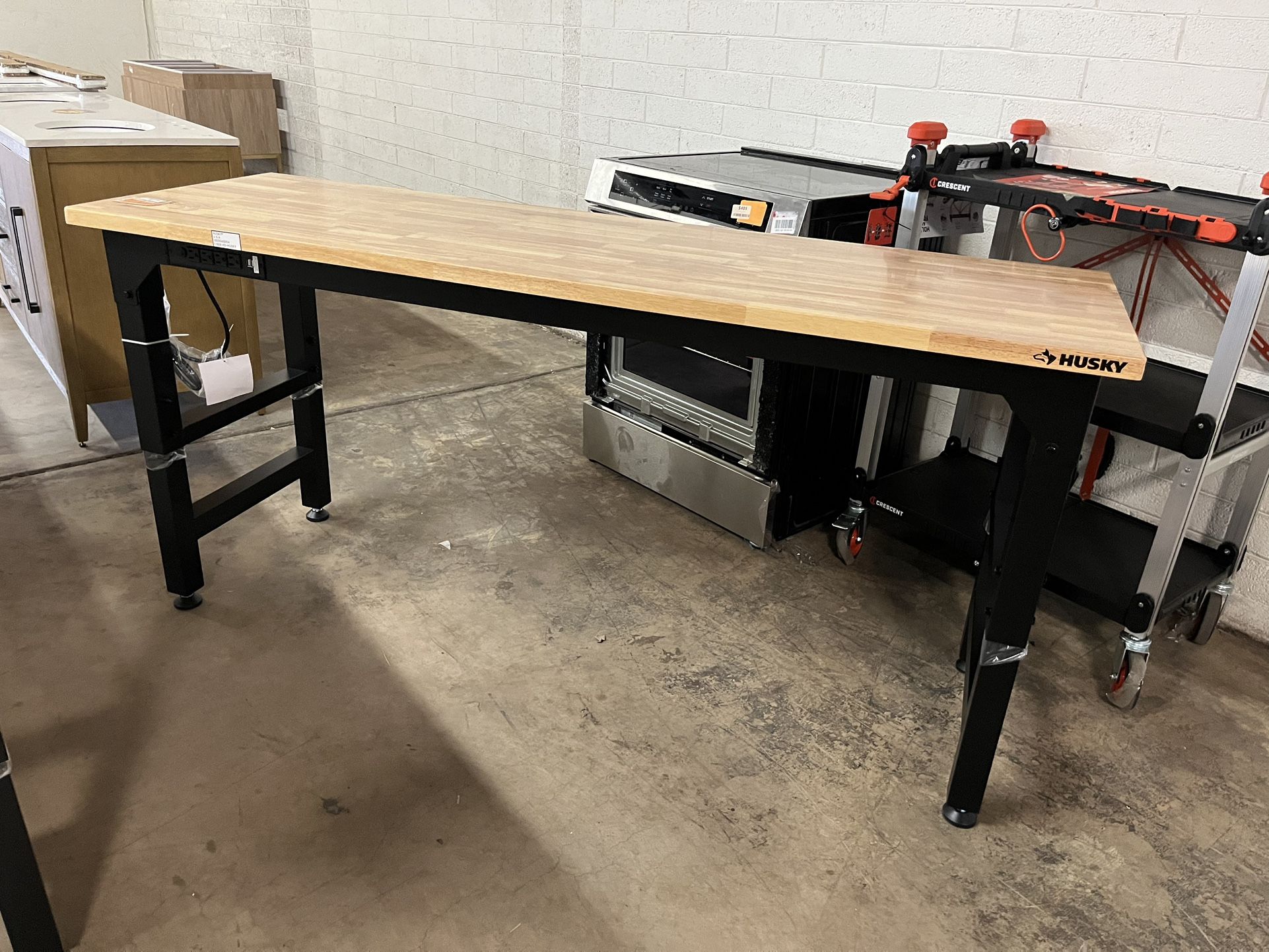 72 in. W x 23 in. D Adjustable Height Black Workbench, Solid Wood Top for Heavy Duty Welded Steel Garage Storage System