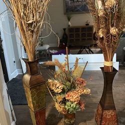 3 vases with flowers