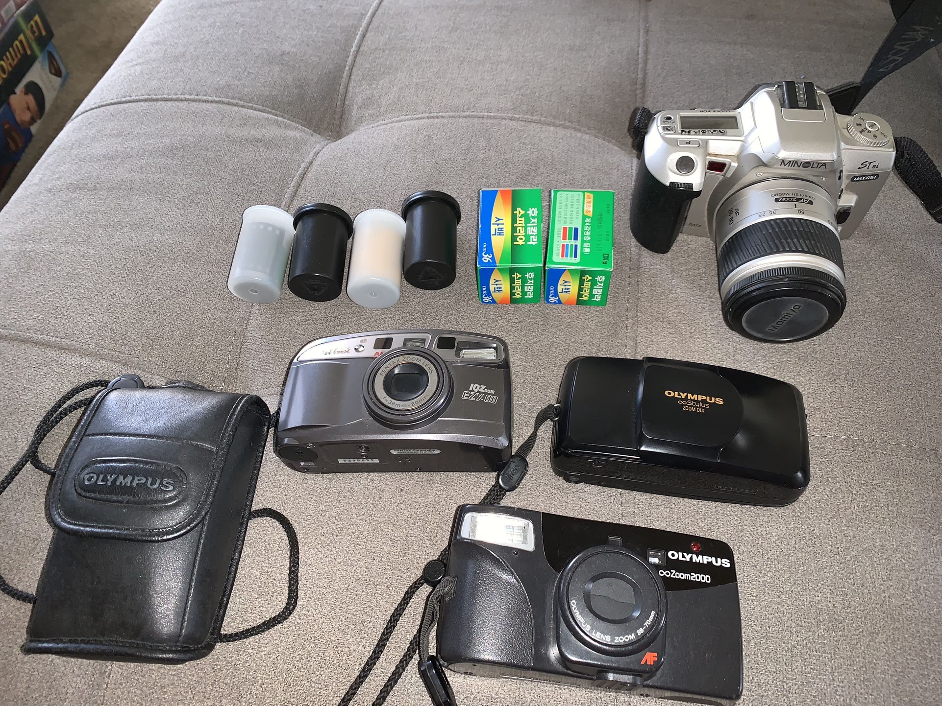  4 - 35mm Camera + Films (( Sold As Is)) Need Battery