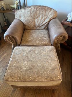 Two leather club chairs
