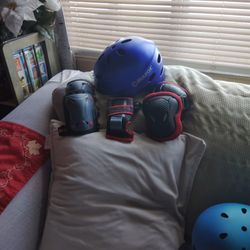 Skateboard Knee Pads Elbow Pads And One Wristband And A Helmet