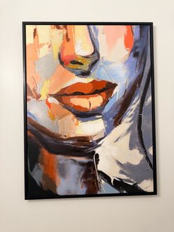 Large colorful panting of women’s face